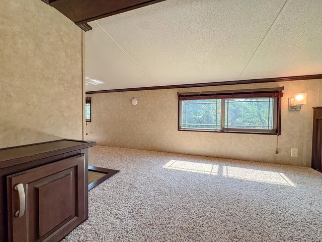 a bathroom with a toilet a sink and a mirror