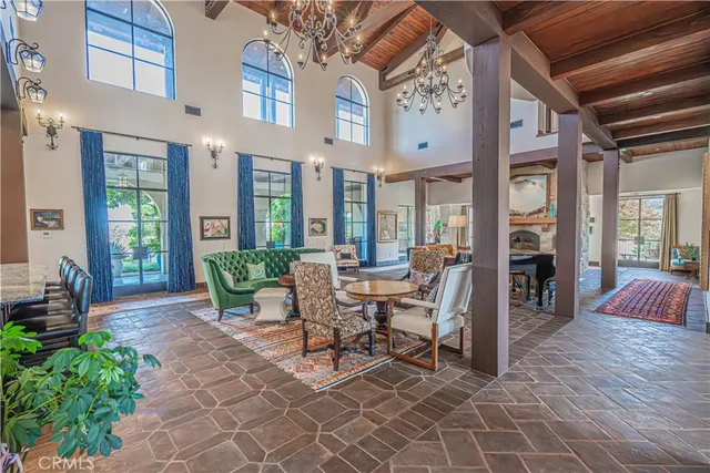 a large kitchen with stainless steel appliances granite countertop a large stove a sink and dishwasher