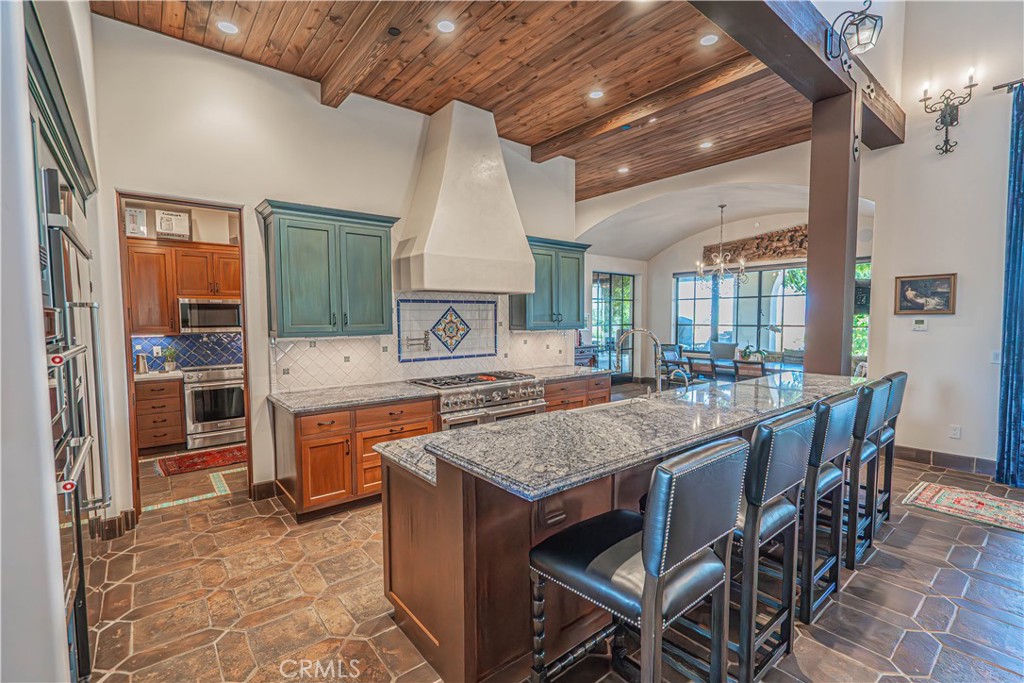 3030 Templeton Road Templeton, CA 93465 - Photo 15 of 75 a kitchen with stainless steel appliances granite countertop a stove and a sink