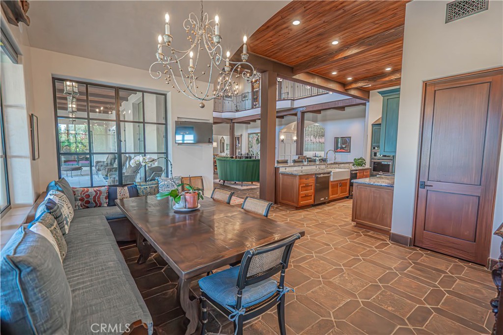 3030 Templeton Road Templeton, CA 93465 - Photo 18 of 75 a view of a dining room with furniture wooden floor and chandelier