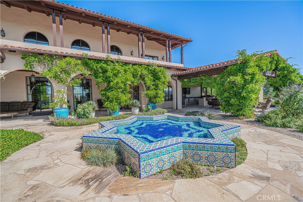3030 Templeton Road Templeton, CA 93465 - Photo 27 of 75 A striking Moorish star fountain adds timeless elegance to the private courtyard.
