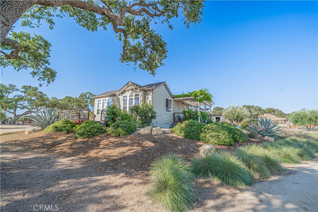 3030 Templeton Road Templeton, CA 93465 - Photo 67 of 75 a front view of a house with a yard and garage