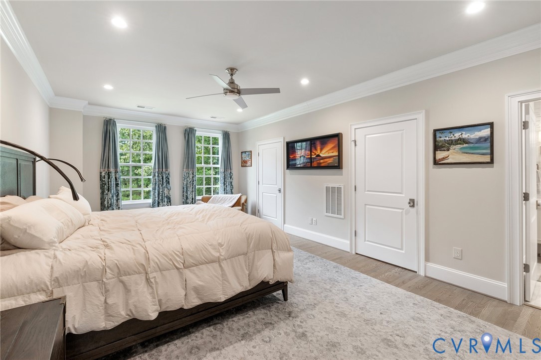 119 Countryside Lane Henrico, VA 23229 - Photo 29 of 76 a bedroom with a large bed and a window