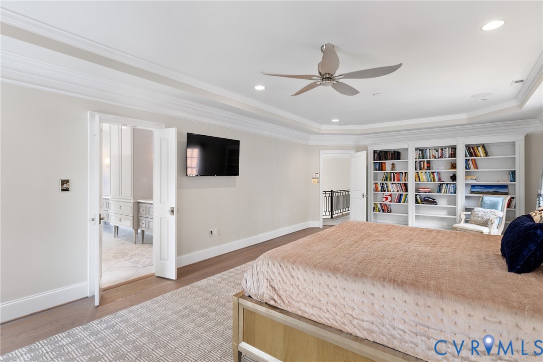 119 Countryside Lane Henrico, VA 23229 - Photo 36 of 76 a spacious bedroom with a bed and a flat screen tv