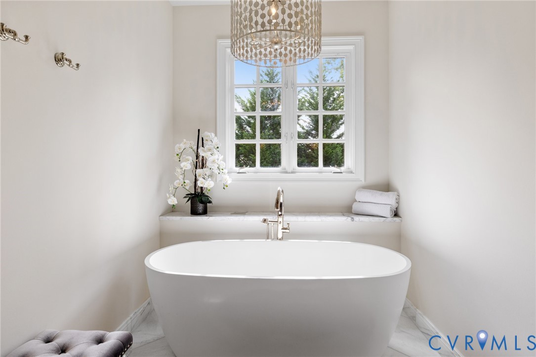 119 Countryside Lane Henrico, VA 23229 - Photo 39 of 76 a white bath tub sitting next to a white sink