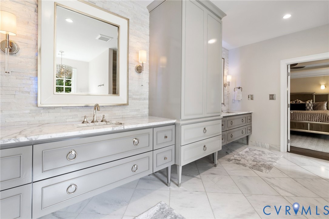 119 Countryside Lane Henrico, VA 23229 - Photo 41 of 76 a spacious bathroom with double sink and a mirror