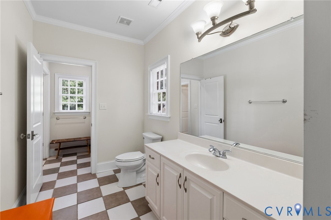 119 Countryside Lane Henrico, VA 23229 - Photo 44 of 76 a bathroom with a sink a toilet a shower and a mirror