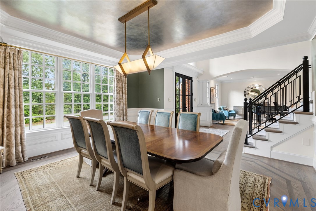 119 Countryside Lane Henrico, VA 23229 - Photo 10 of 76 a view of a dining room with furniture window and wooden floor