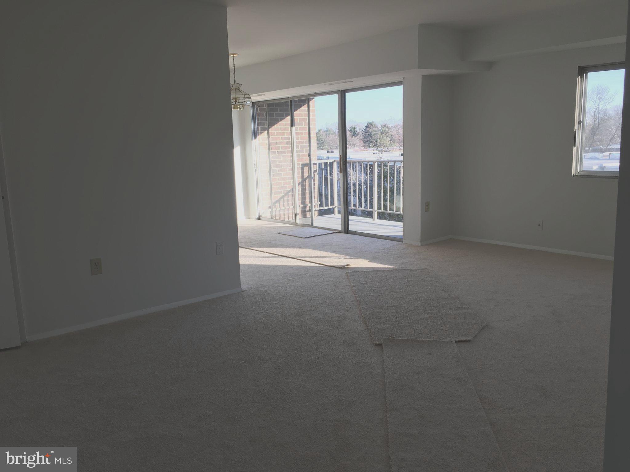 3802 Bel Pre Road, Unit 1327 Silver Spring, MD 20906 - Photo 2 of 26 Living and Dining room