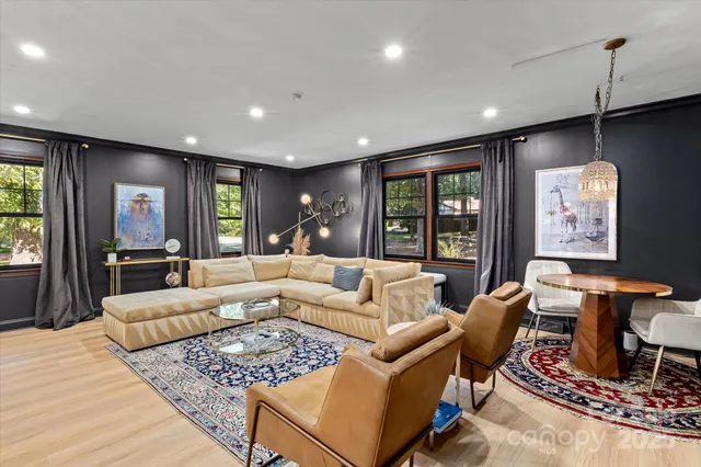 a living room with furniture or outdoor view and a large window