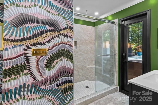 a bathroom with a bathtub and a shower