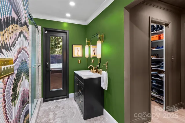 a bathroom with a sink a mirror and bathtub