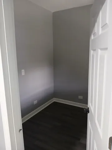 a view of small space with wooden floor