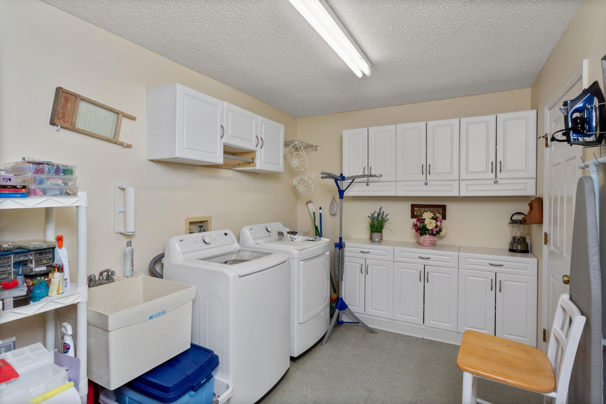 13004 Indian Trail Road Broadway, VA 22815 - Photo 39 of 56 a view of kitchen with white cabinets and white appliances