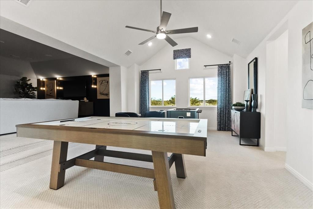 14550 Helena Street Pilot Point, TX 76258 - Photo 11 of 14 a room with stainless steel appliances kitchen island granite countertop furniture and a view of kitchen