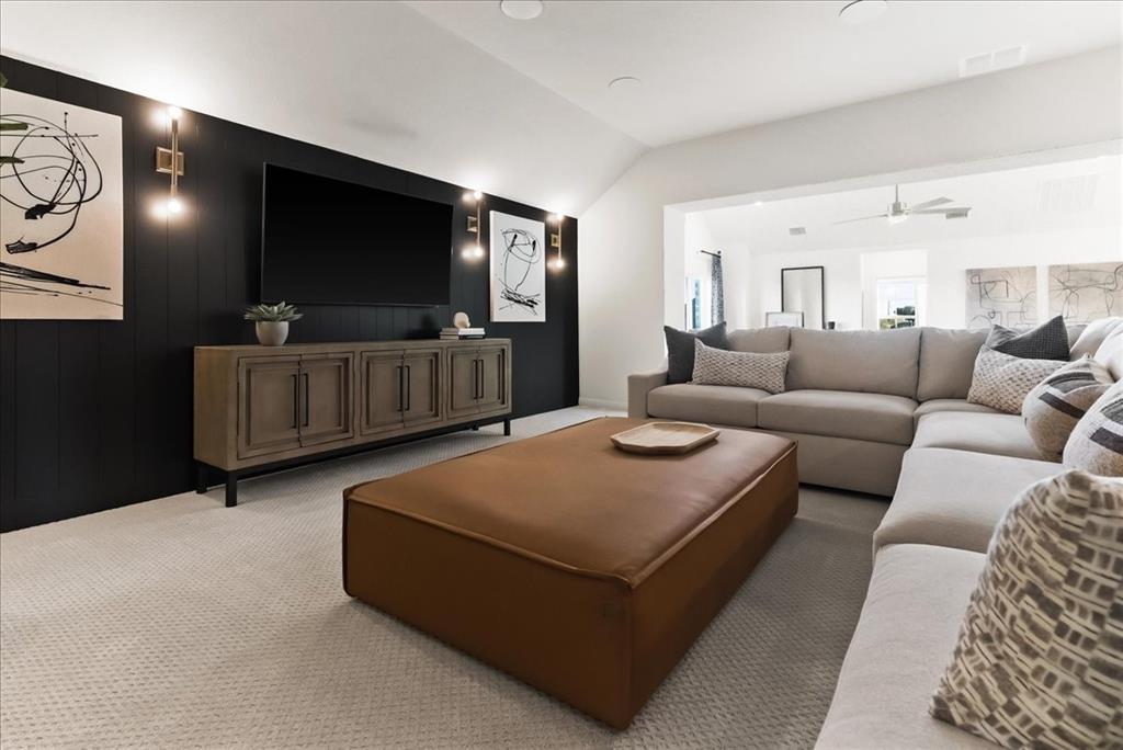 14550 Helena Street Pilot Point, TX 76258 - Photo 12 of 14 a living room with furniture and a flat screen tv