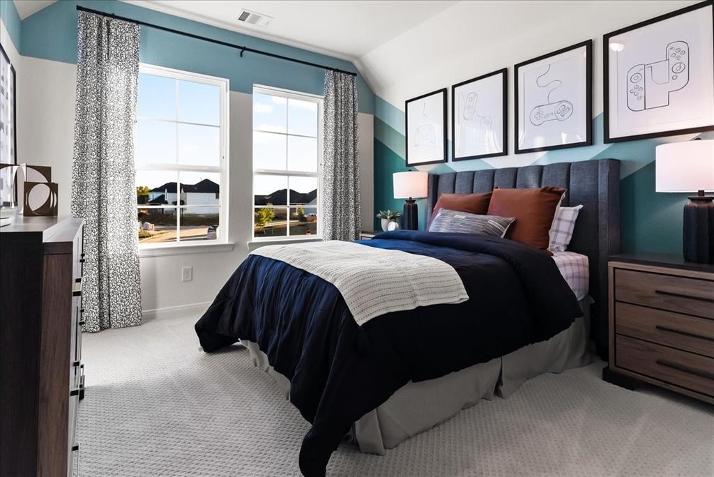 14550 Helena Street Pilot Point, TX 76258 - Photo 14 of 14 a bedroom with a bed next to a window