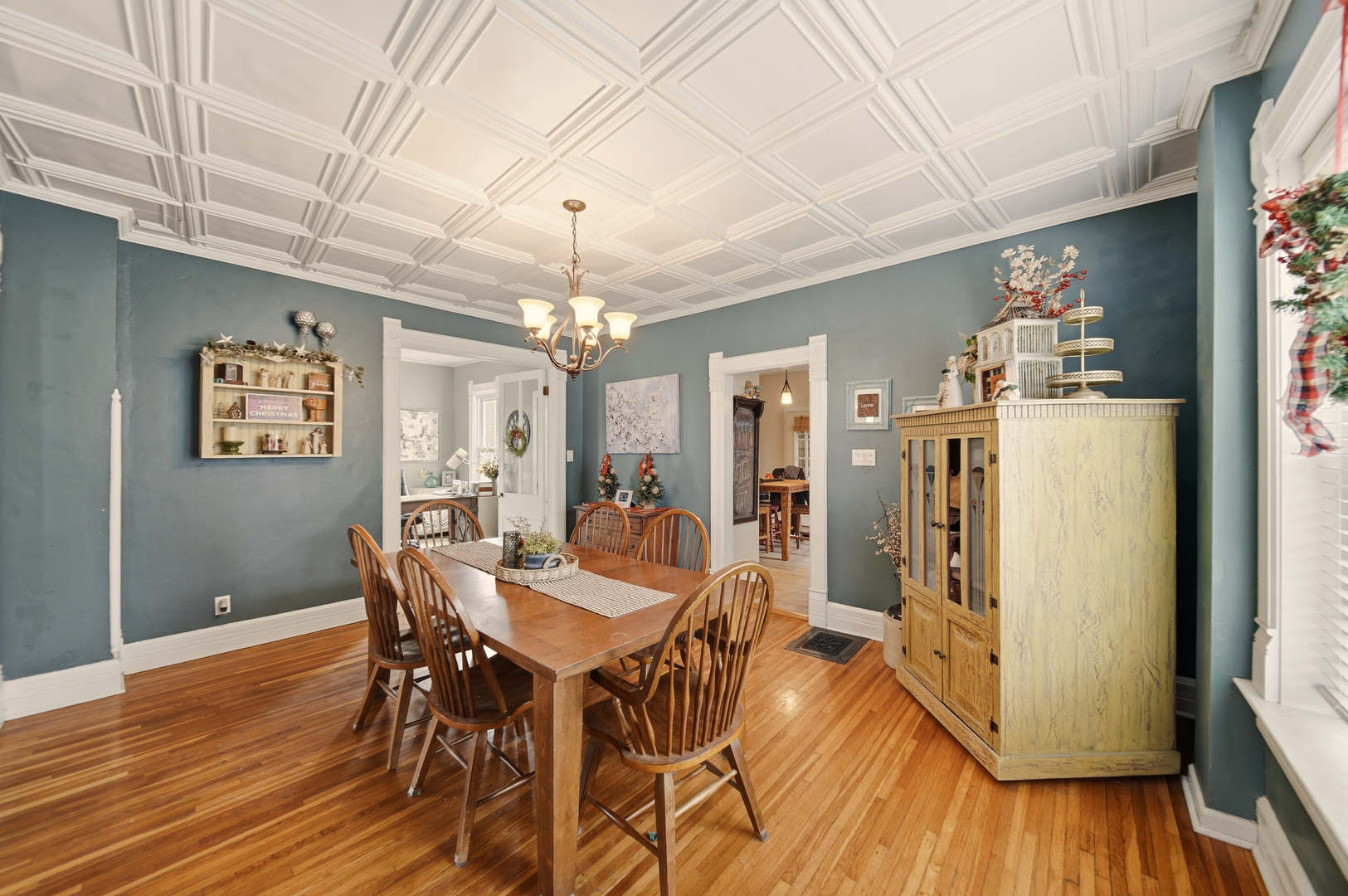 316 East 3rd Street Dixon, IL 61021 - Photo 11 of 45 a view of a dining room with furniture and wooden floor