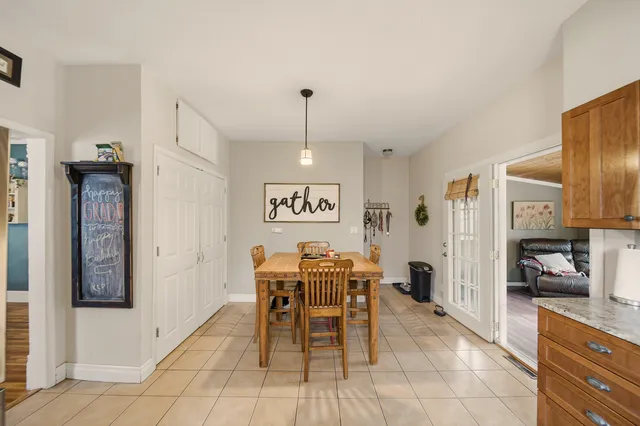 a view of a dining room with furniture