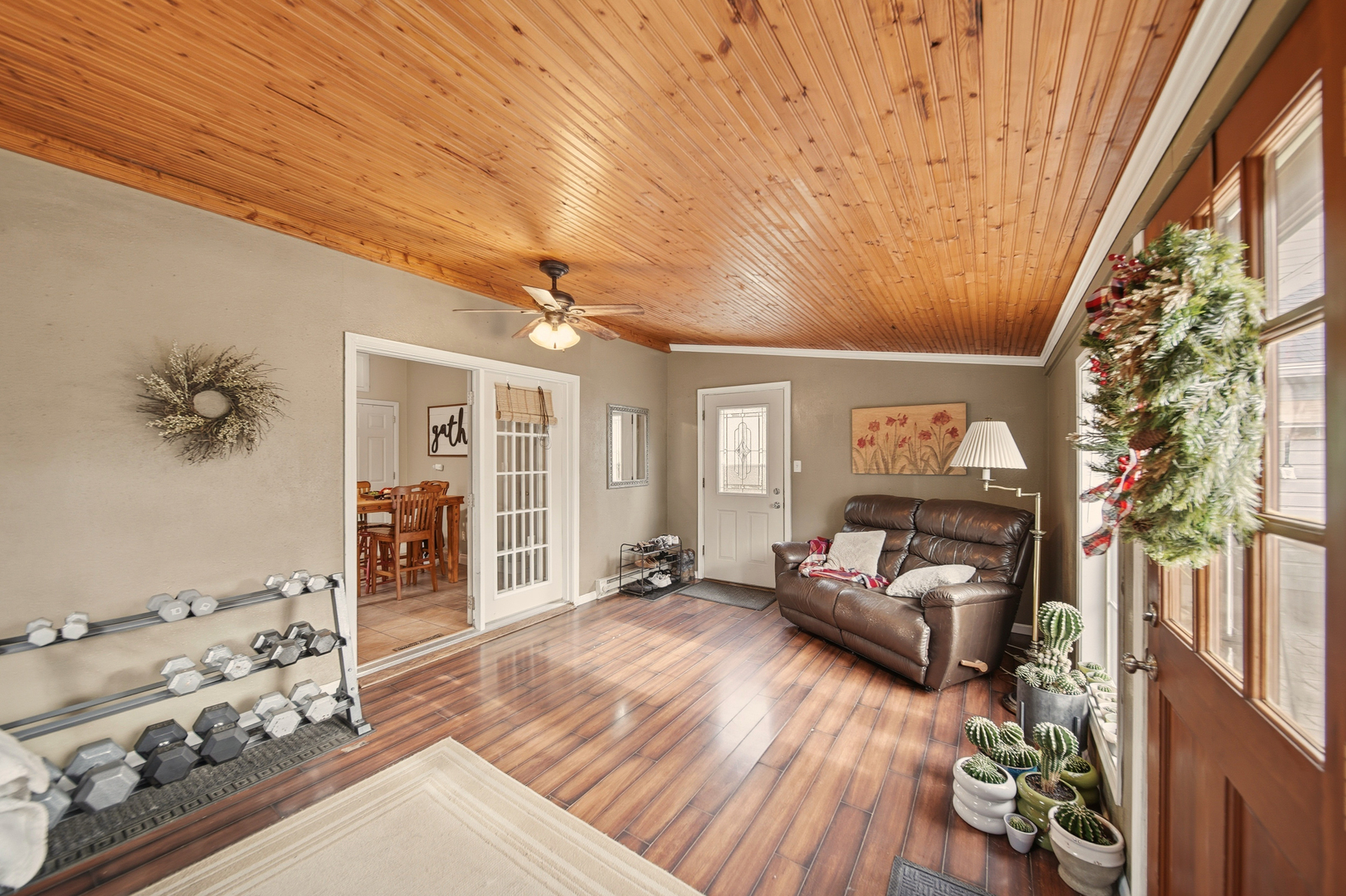 316 East 3rd Street Dixon, IL 61021 - Photo 19 of 45 a living room with furniture and wooden floor