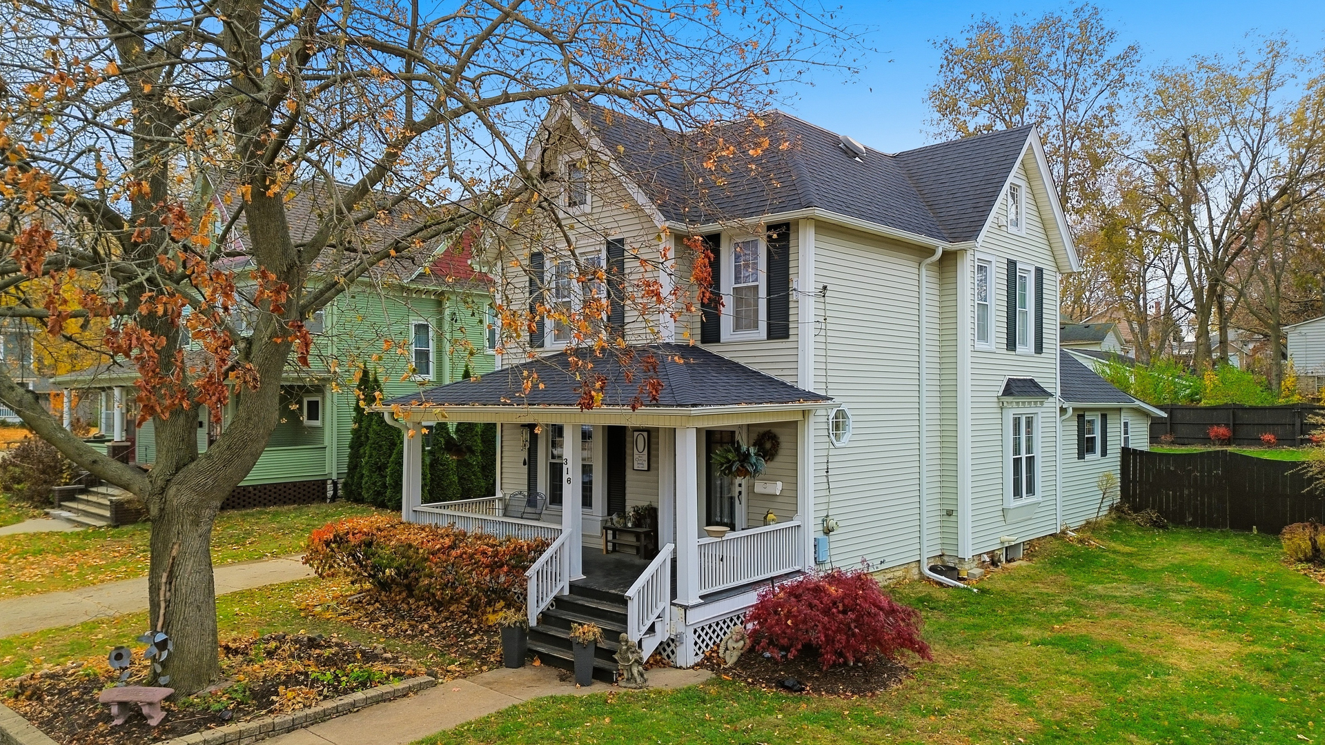 316 East 3rd Street Dixon, IL 61021 - Photo 2 of 45 a view of house with a yard