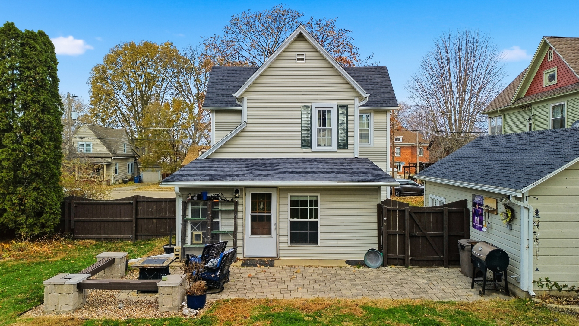 316 East 3rd Street Dixon, IL 61021 - Photo 32 of 45 a front view of a house with a yard and outdoor seating