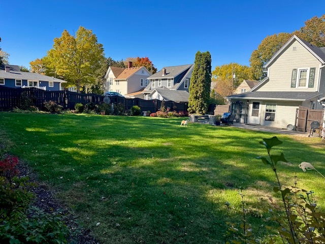 316 East 3rd Street Dixon, IL 61021 - Photo 42 of 45 a view of a house with a big yard and potted plants