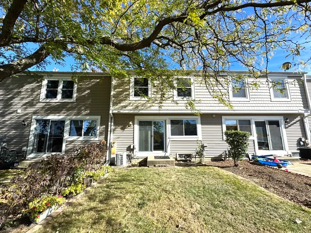 a view of backyard with green space