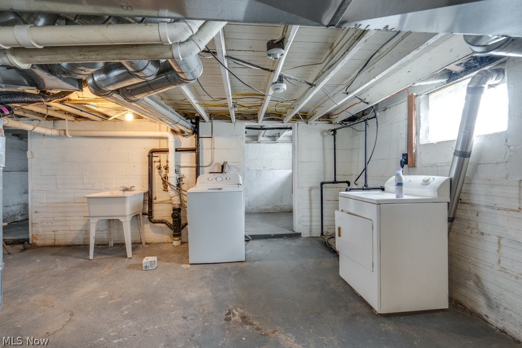 12 South 4th Street Rittman, OH 44270 - Photo 42 of 48 Below grade area with independent washer and dryer and a sink