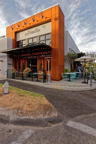 a view of a water fountain in front of a building