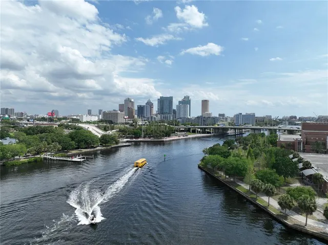 an aerial view of a house with outdoor space