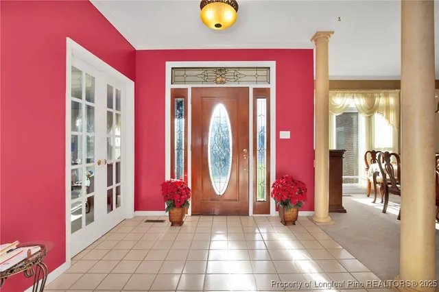 a view of living room with furniture and closet
