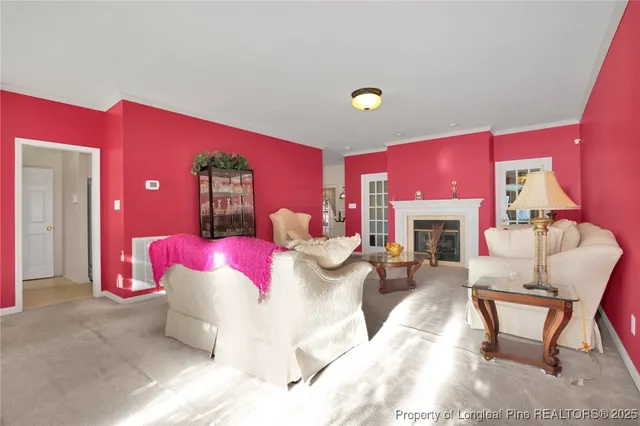 a bedroom with a bed and a fireplace