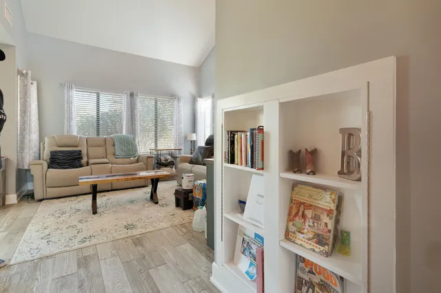 a living room with furniture and a couch