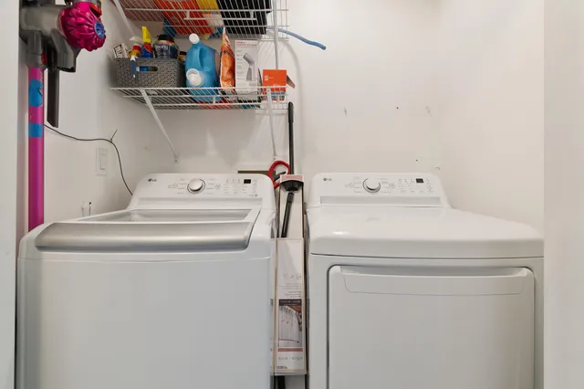 a utility room with dryer and washer
