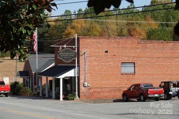 a car parked in front of a brick building
