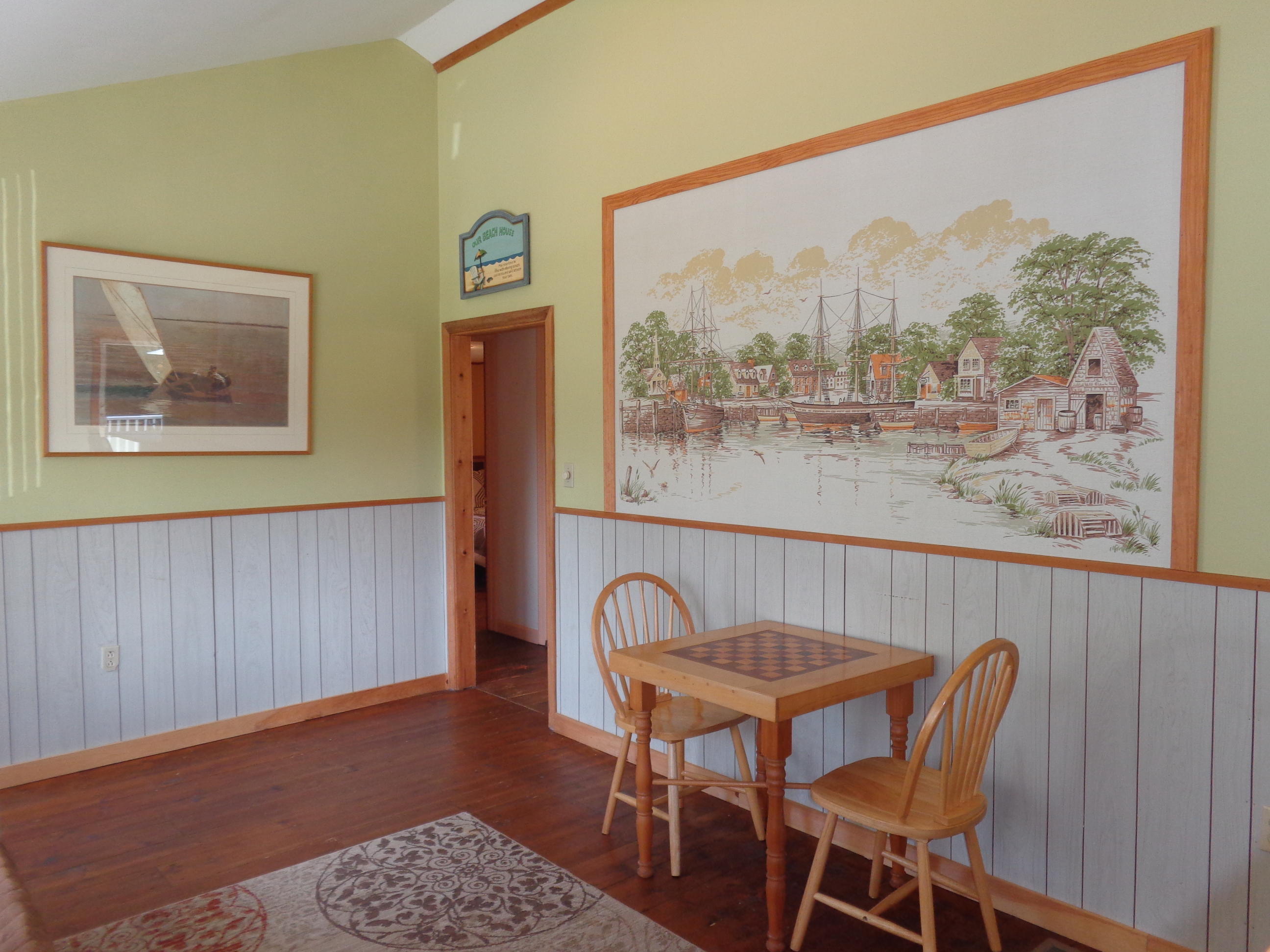 6 Huckleberry Lane Dennis Port, MA 02639 - Photo 12 of 23 a view of a dining room with furniture and outdoor view
