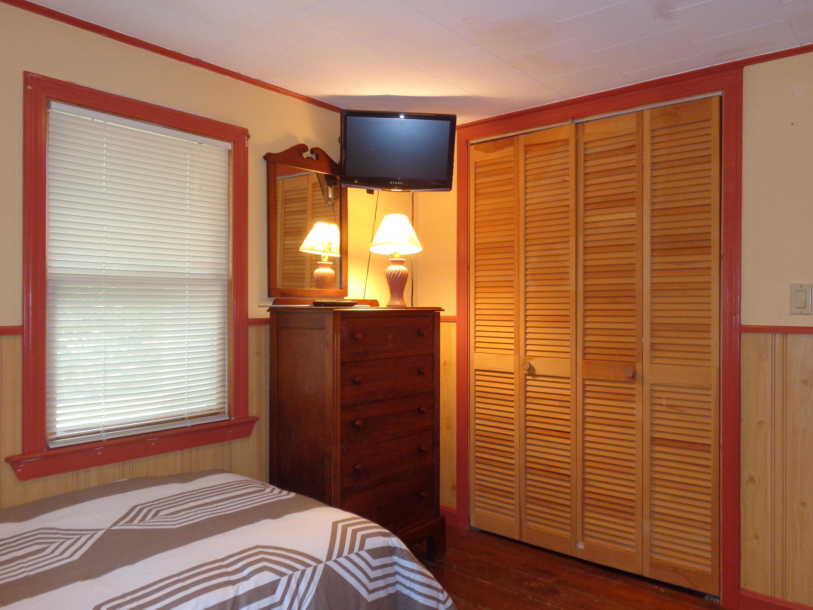 6 Huckleberry Lane Dennis Port, MA 02639 - Photo 16 of 23 a bedroom with a bed and a dresser