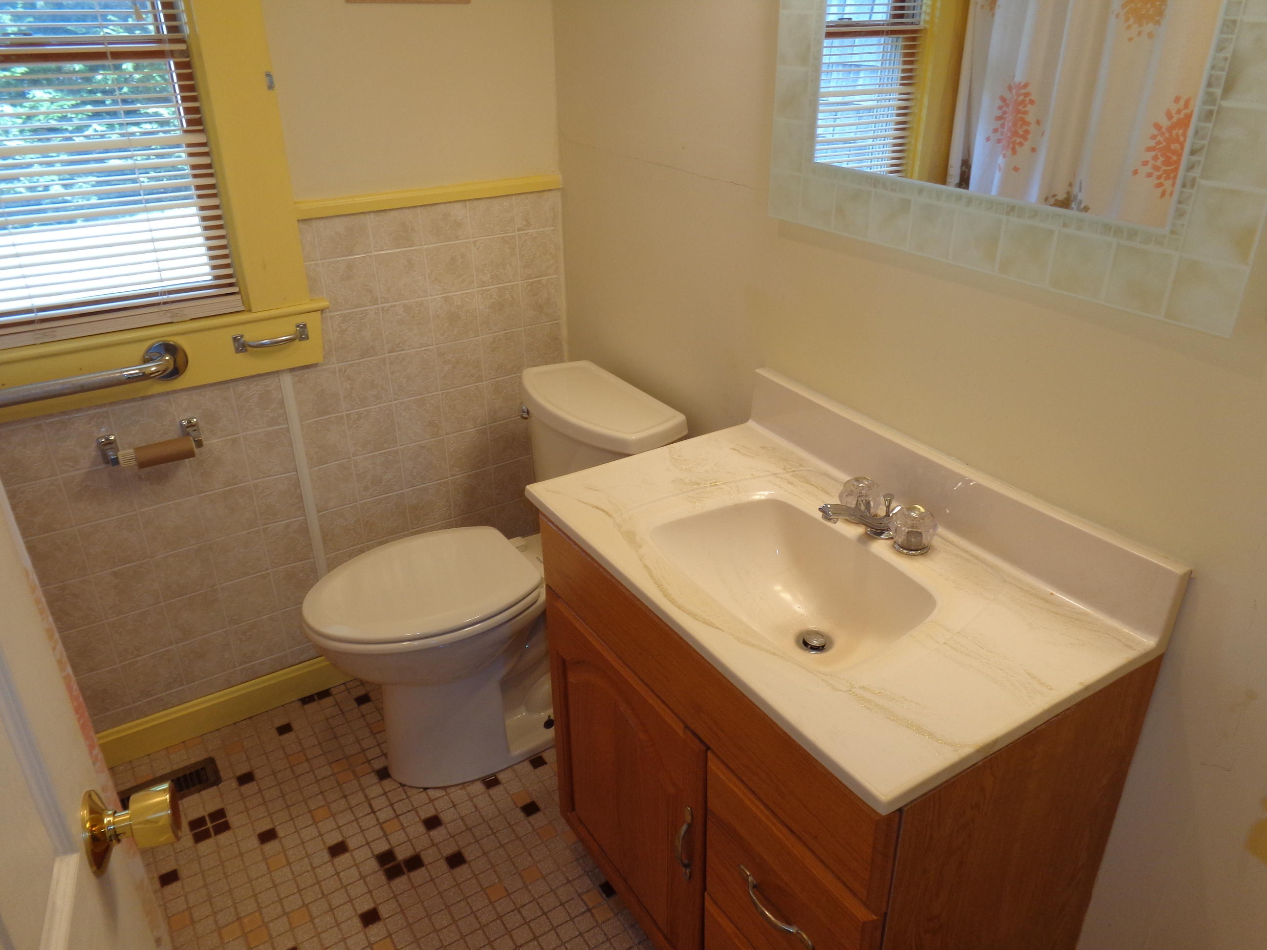 6 Huckleberry Lane Dennis Port, MA 02639 - Photo 17 of 23 a bathroom with a sink toilet and mirror