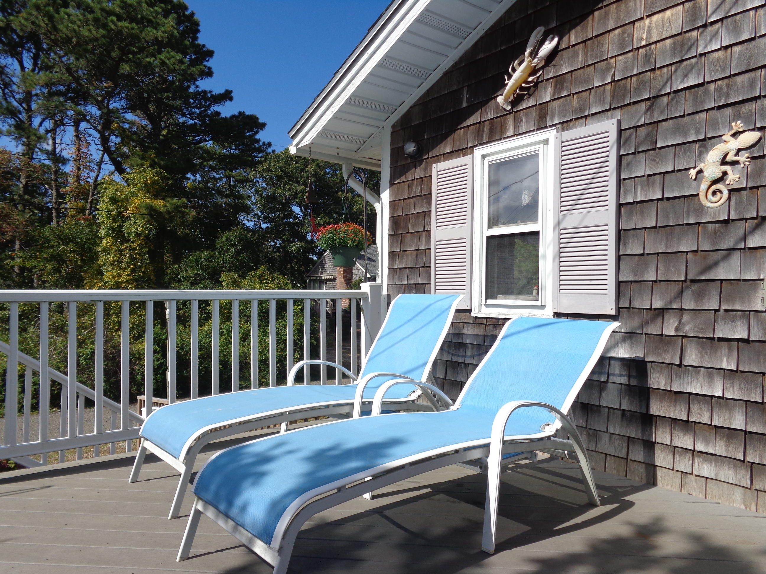6 Huckleberry Lane Dennis Port, MA 02639 - Photo 4 of 23 a view of a patio with wooden floor