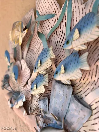 a view of a chairs and table in backyard
