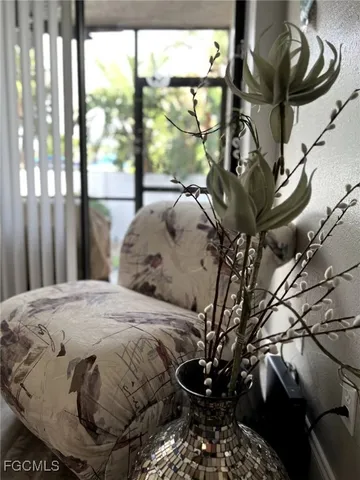 a living room with large windows
