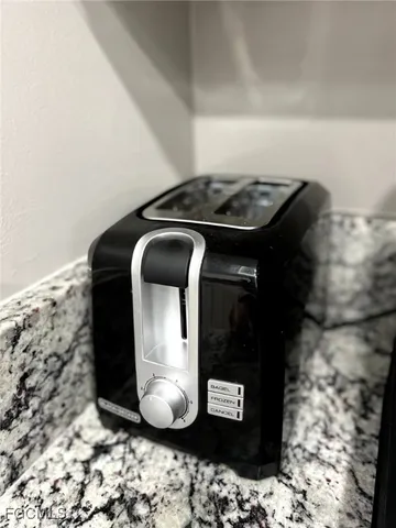 a bedroom with a bed and dresser