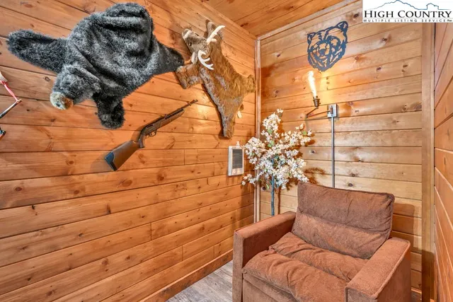 a front view of a house with a yard table and chairs