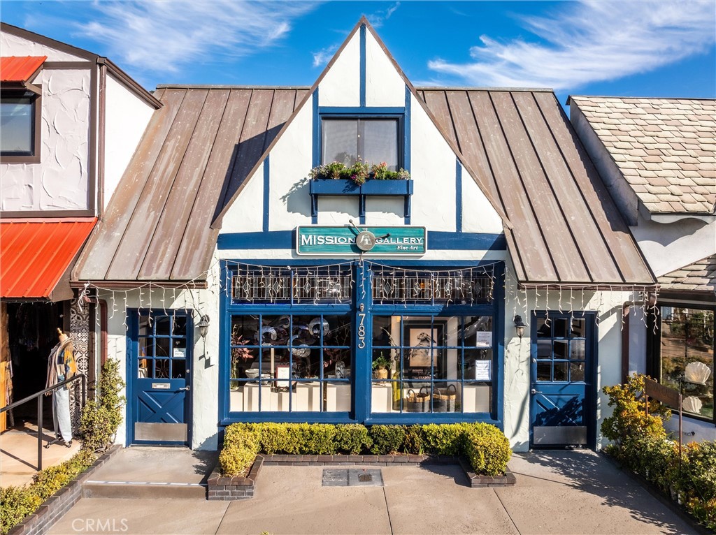 783 Main Street Cambria, CA 93428 - Photo 1 of 1 a view of a building with a window and sitting area