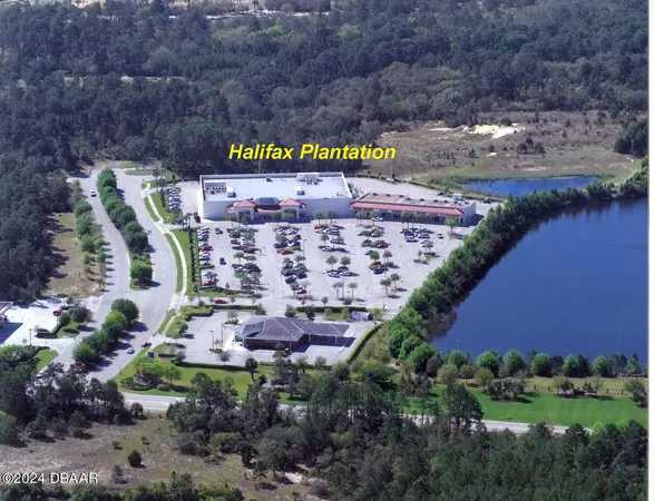 a view of a park with welcome board