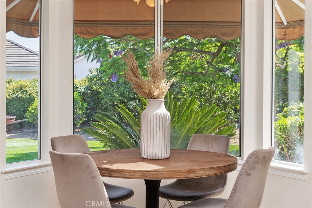1795 Palomares Road Fallbrook, CA 92028 - Photo 14 of 37 a view of a dining room with furniture window and wooden floor