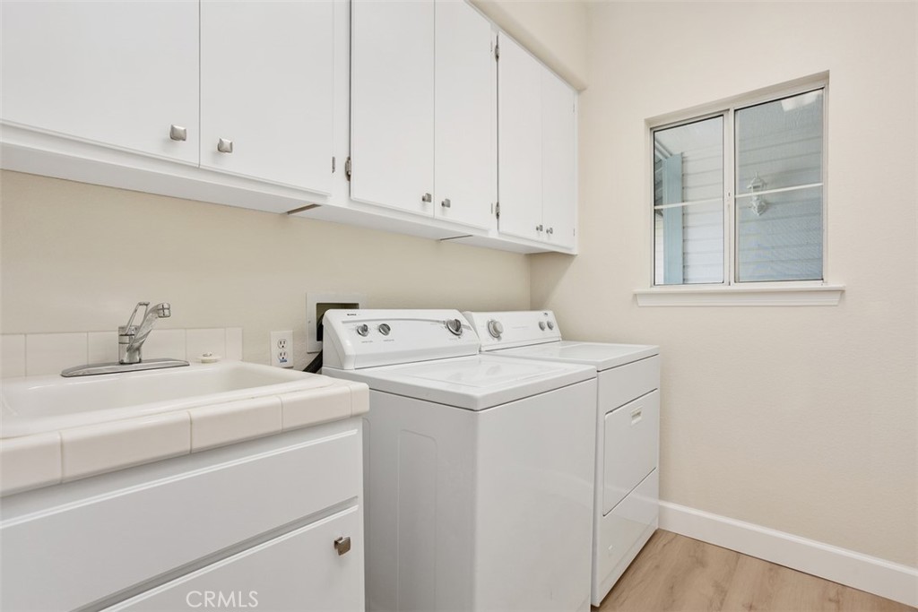1795 Palomares Road Fallbrook, CA 92028 - Photo 26 of 37 a utility room with dryer and washer