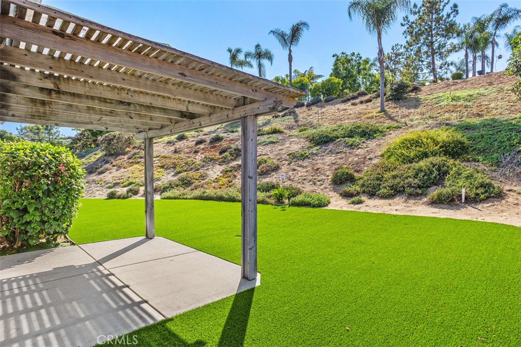 1795 Palomares Road Fallbrook, CA 92028 - Photo 32 of 37 a view of a backyard with garden