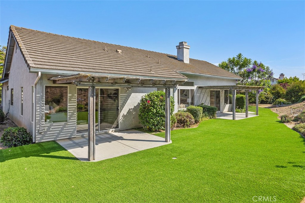1795 Palomares Road Fallbrook, CA 92028 - Photo 33 of 37 a view of a house with a yard porch and sitting area